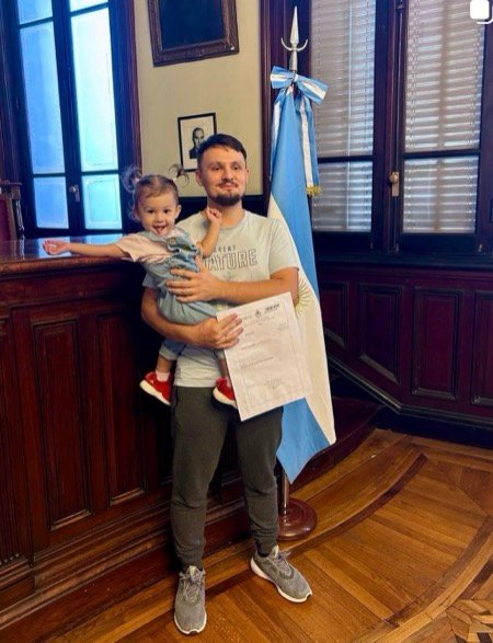 A father and daughter, celebrating together